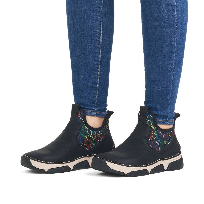 Rieker Artikelnummer 45957-00 Rieker Damen Slipper urbanschwarz-bunt Nur noch ein Tag übrig